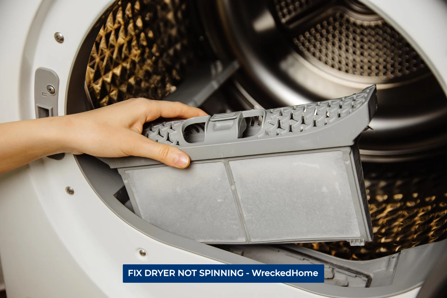 WORKER FIXING DRYER NOT SPINNING