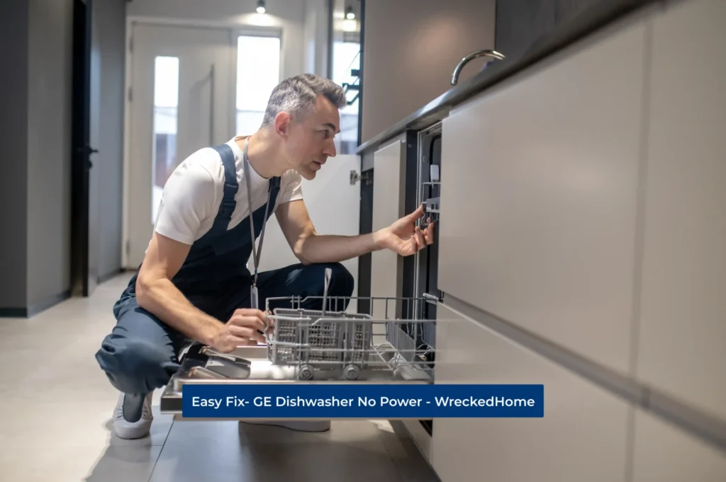 Worker Fixing GE Dishwasher