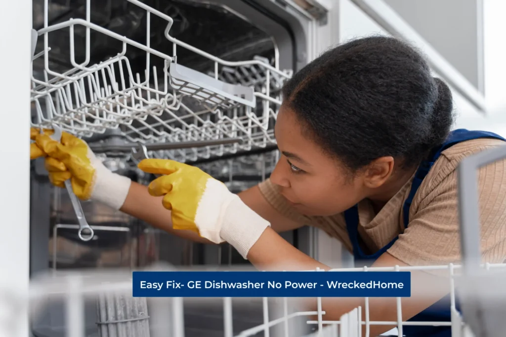 Worker Fixing GE Dishwasher