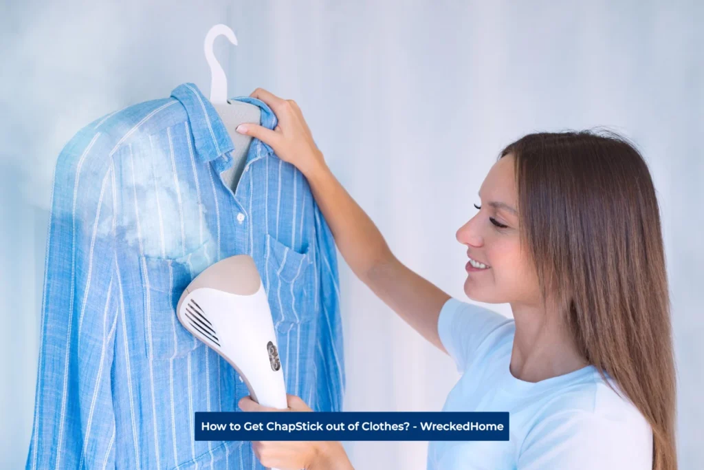 Women getting ChapStick out of Clothes using a steamer