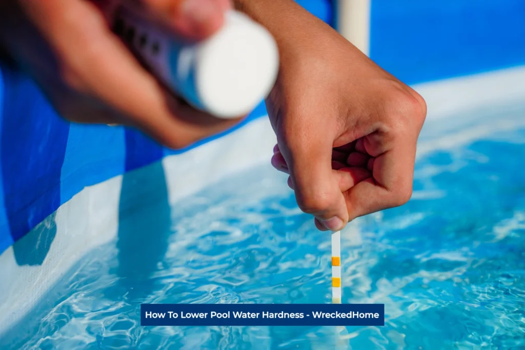 Man Testing Pool Water Hardness. How to Lower Pool Water Hardness
