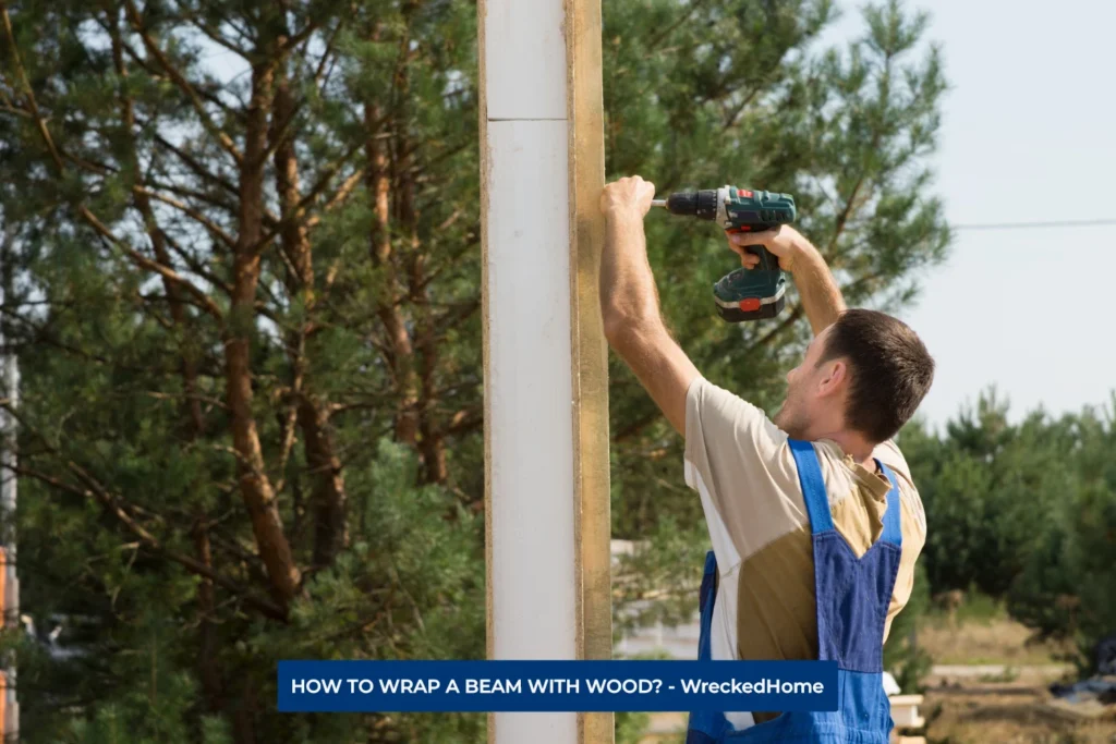 WORKER WRAPPING A BEAM WITH WOOD.