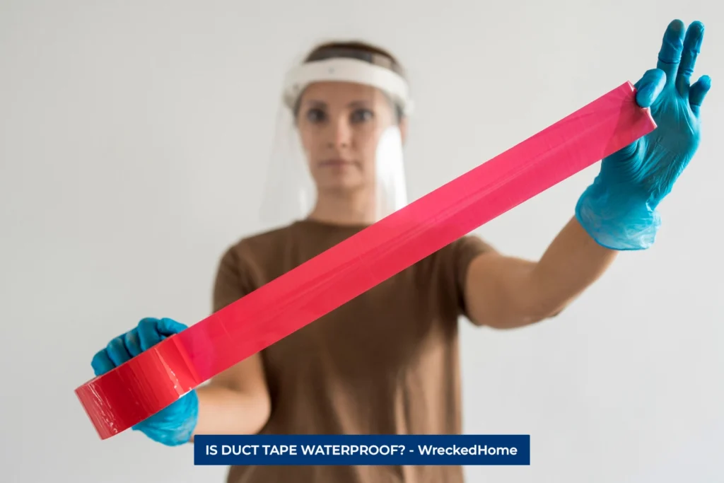 WOMAN HOLDING WIDE-OPENED DUCT TAPE.